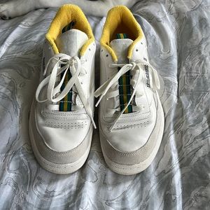 Teal and yellow reeboks